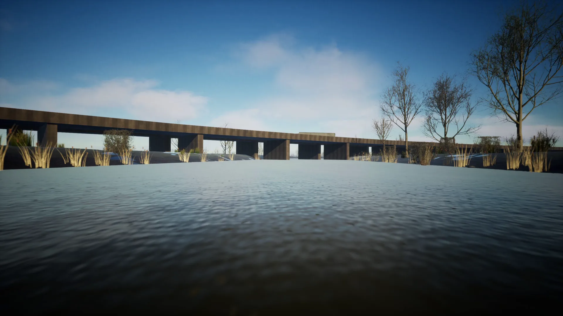 A low view over the murky River Don towards St George's Bridge